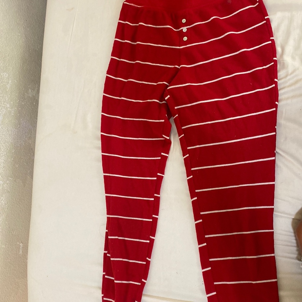 These are red pajama pants with white stripes.